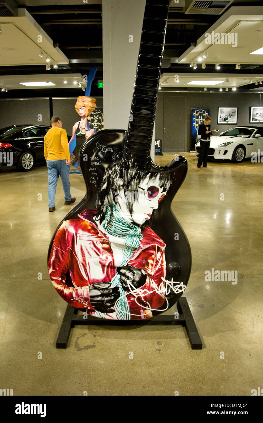 LA, California, USA. 20th Feb 2014.  The 10-foot tall Gibson guitar art sculptures that have lined THE SUNSET STRIP will end their year-long tour on Friday, February 21, 2014, when they are auctioned for charity at a gala event at Bonham's in Los Angeles. This is the third installment of the annual public art project, and all proceeds from this auction will benefit Music For Relief, the nonprofit organization founded by members of Linkin Park to support disaster relief, provide aid to survivors of natural disasters and support the prevention of such disasters via environmental programs. © Robe Stock Photo