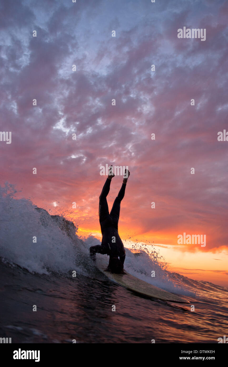 Headstand on surfboard hires stock photography and images Alamy