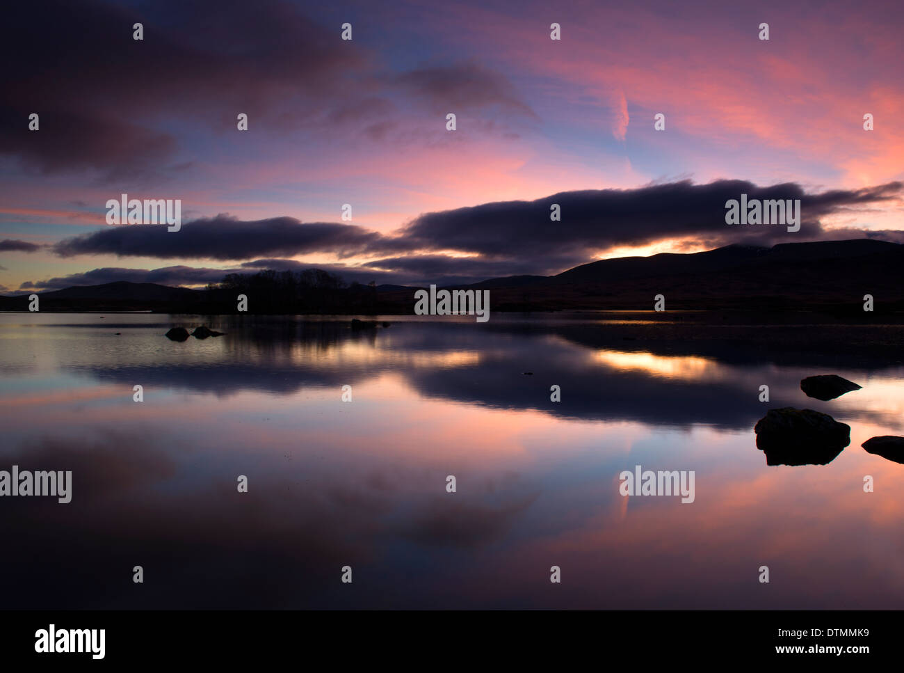Sunrise reflections at Loch Ba, Rannoch Moor Scotland UK Stock Photo