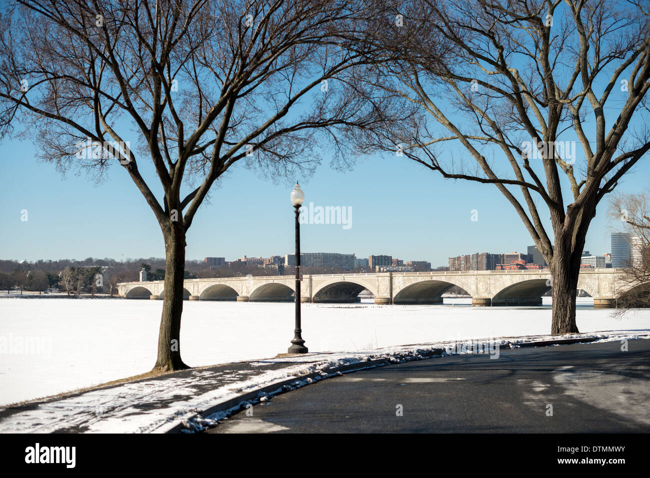 WASHINGTON DC, USA - The Potomac running through Washington DC is frozen and covered with a layer of snow. The region has experienced an unusually cold winter, with sustained low temperatures. Stock Photo