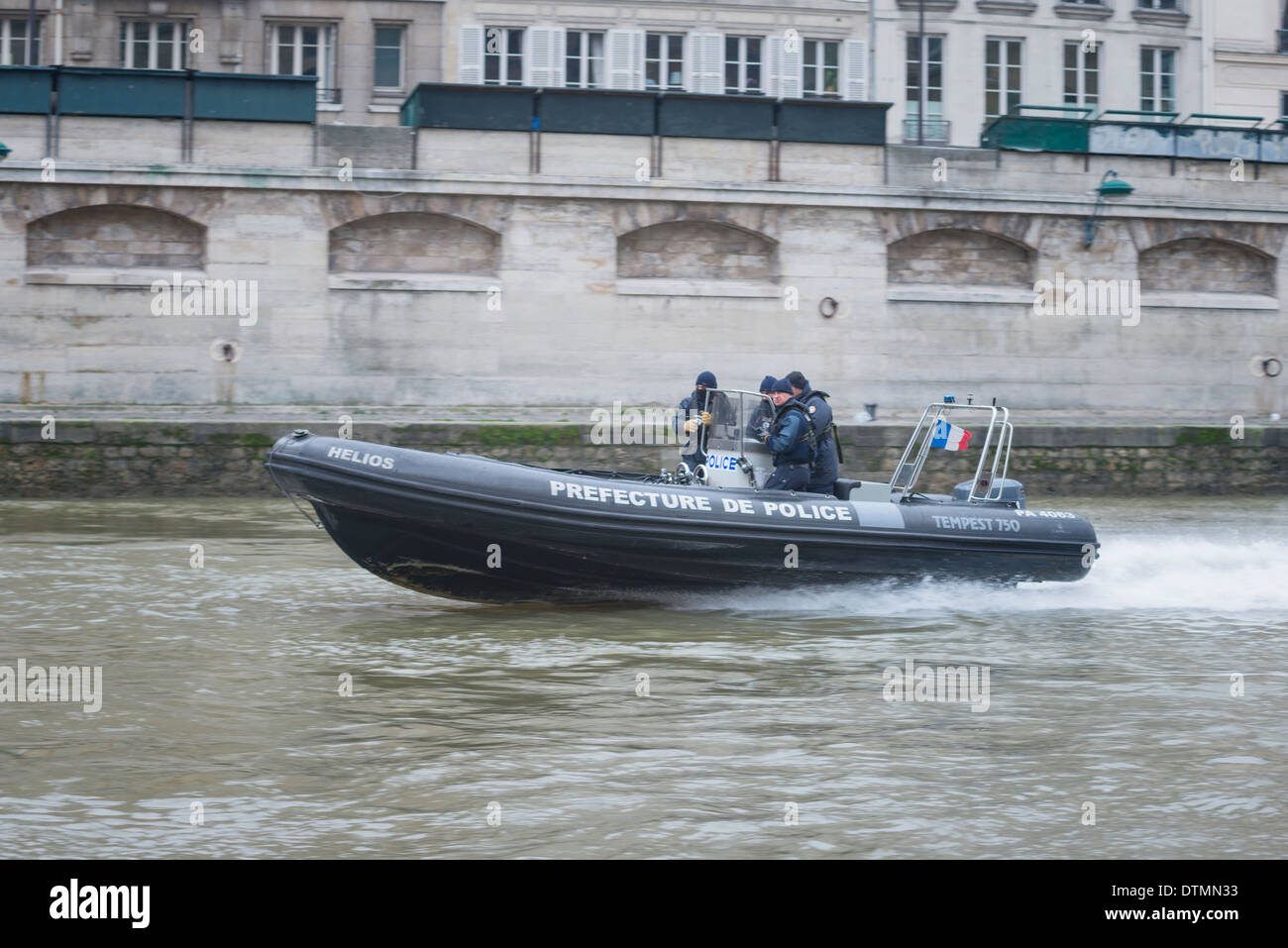 The Prefecture de police in a high powered rigid inflatable boat on the river Seine in Paris. Stock Photo