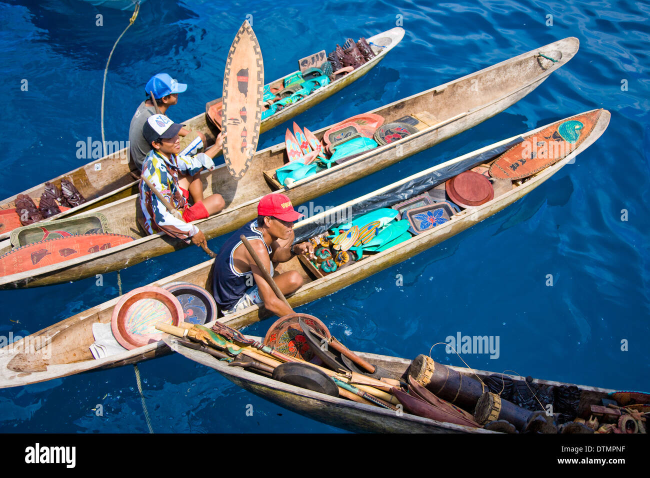 international canoes boating third world country fishing indonesia Stock Photo
