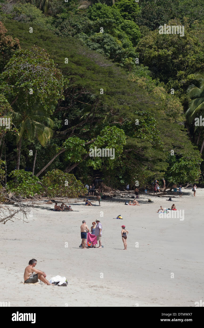 People preparing to enjoy the sun and beach. Playa Manuel Antonio National Park. Costa Rica. Central America. Stock Photo