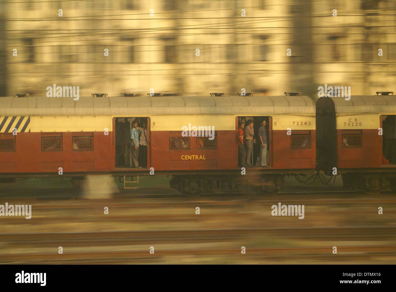 Moving overloaded train in Mumbai, India Stock Photo
