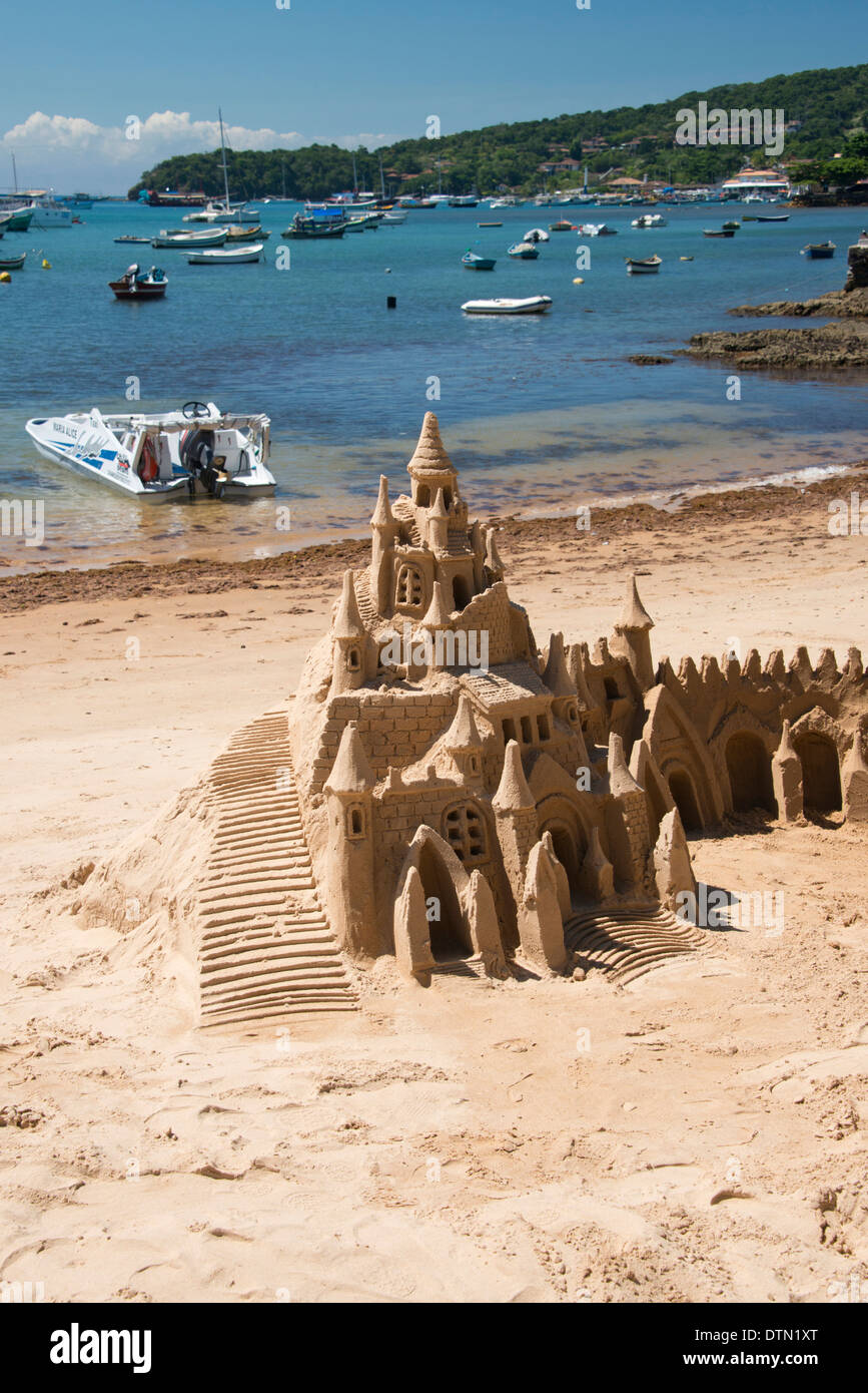 Brazil, Rio de Janeiro, Buzios. Sand castle on beach. Stock Photo