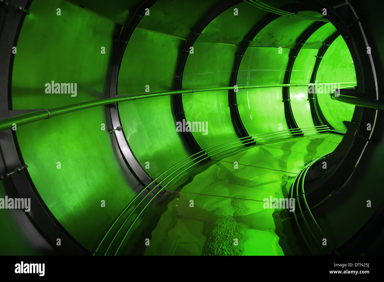 Abstract green underground industrial sewerage tunnel interior Stock Photo