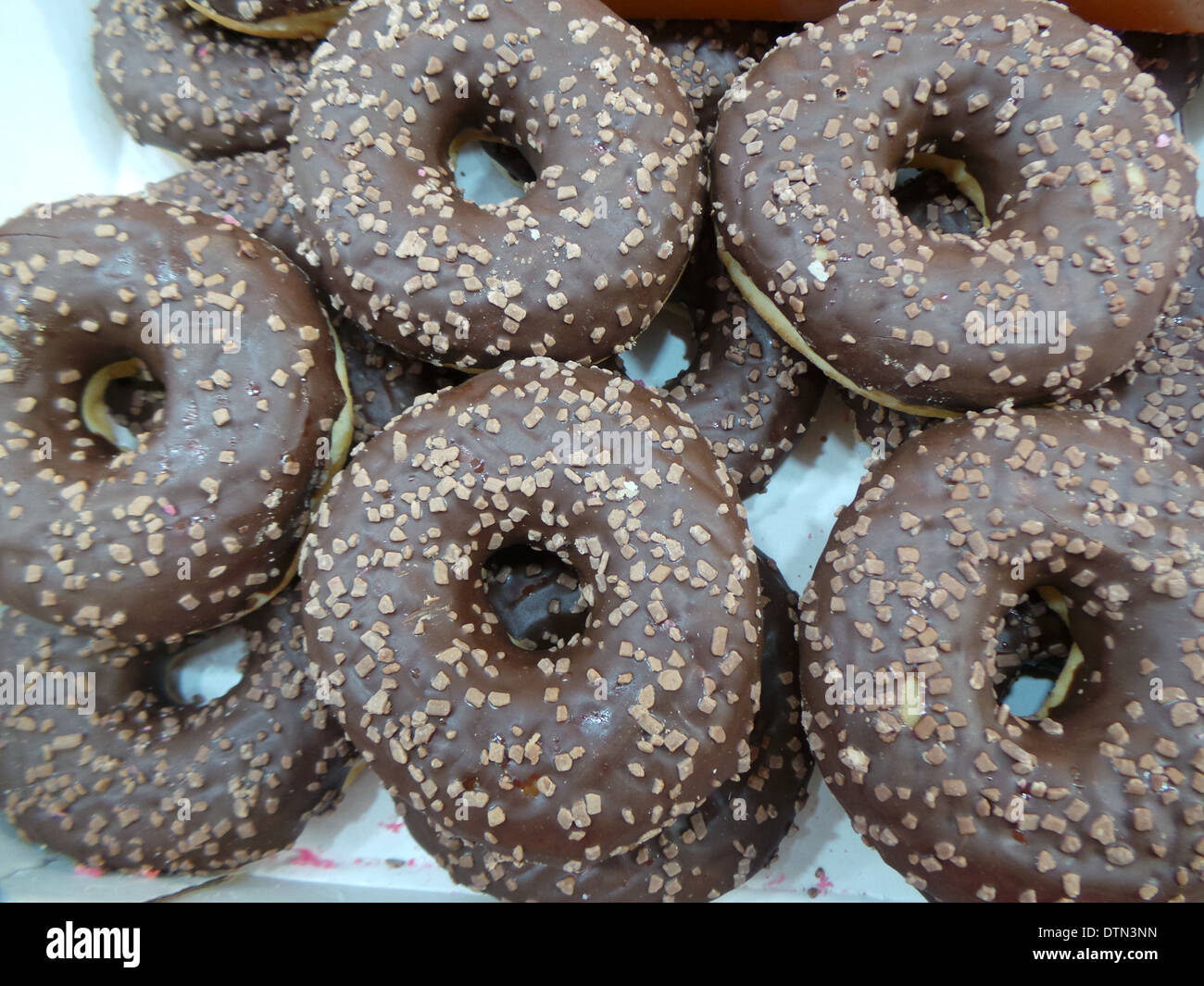 Glazed chocolate donuts Stock Photo