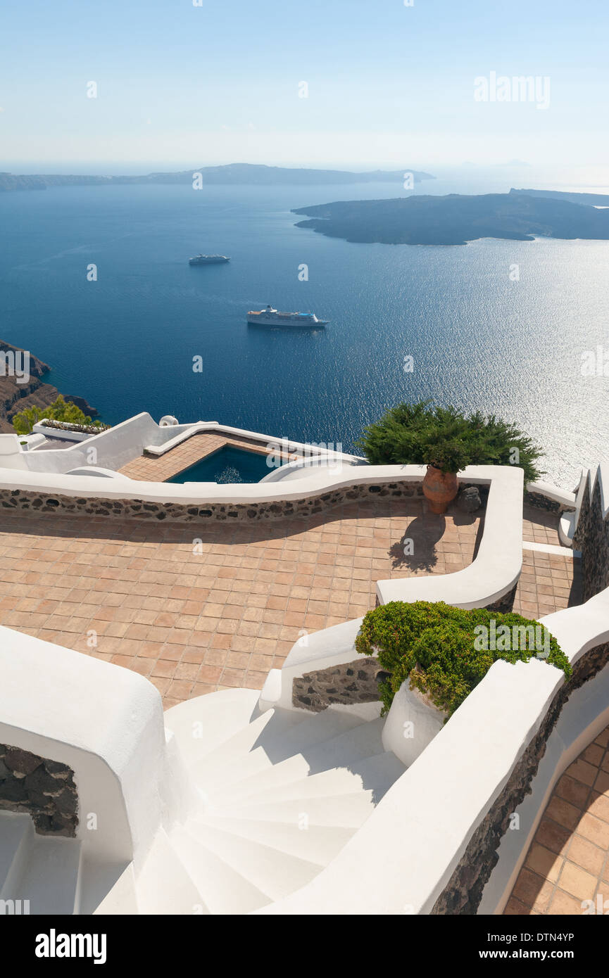 Stairs leading to Terrace by the sea in Santorini Greece Stock Photo