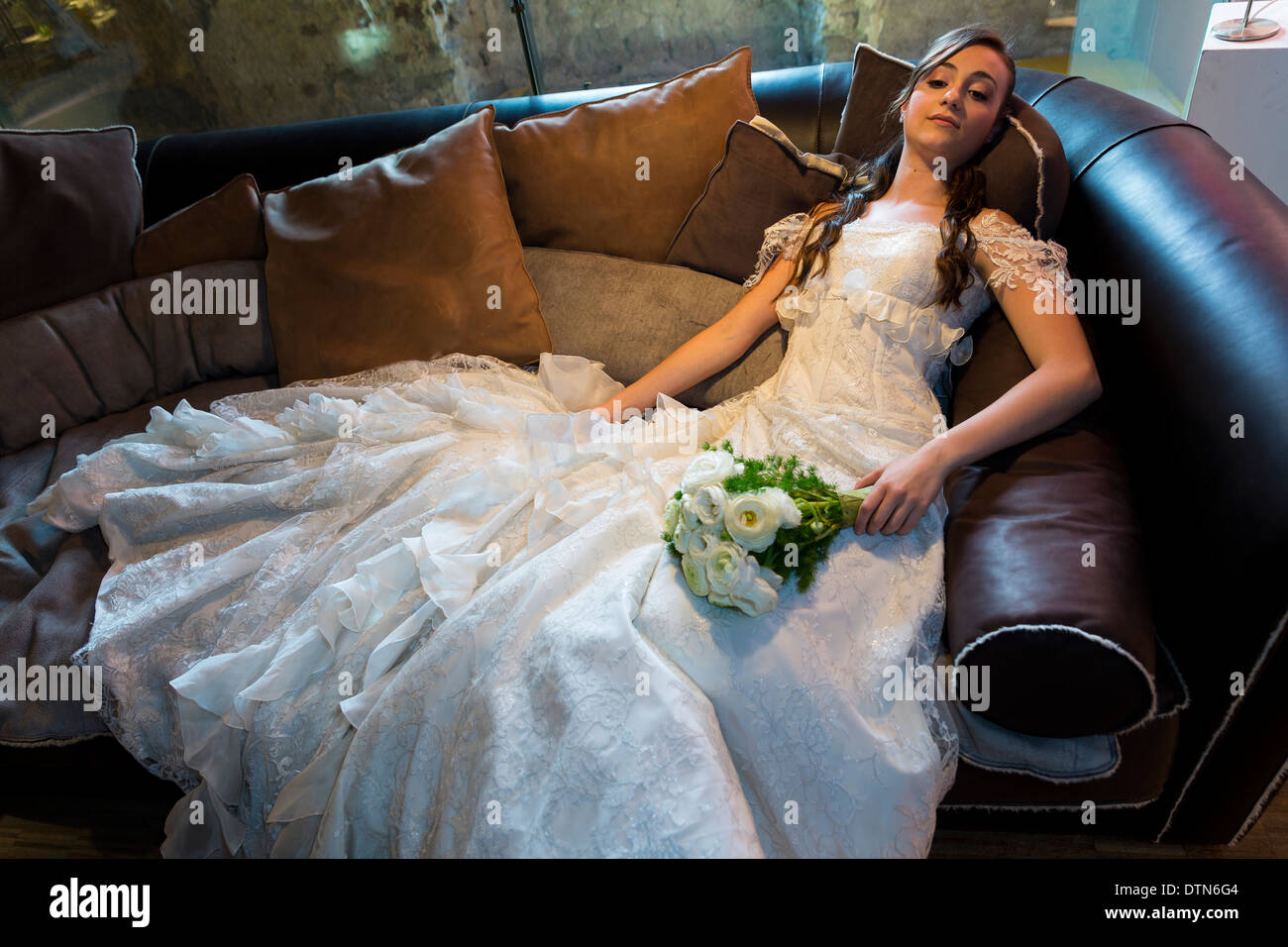 Bride portrait on couch Stock Photo