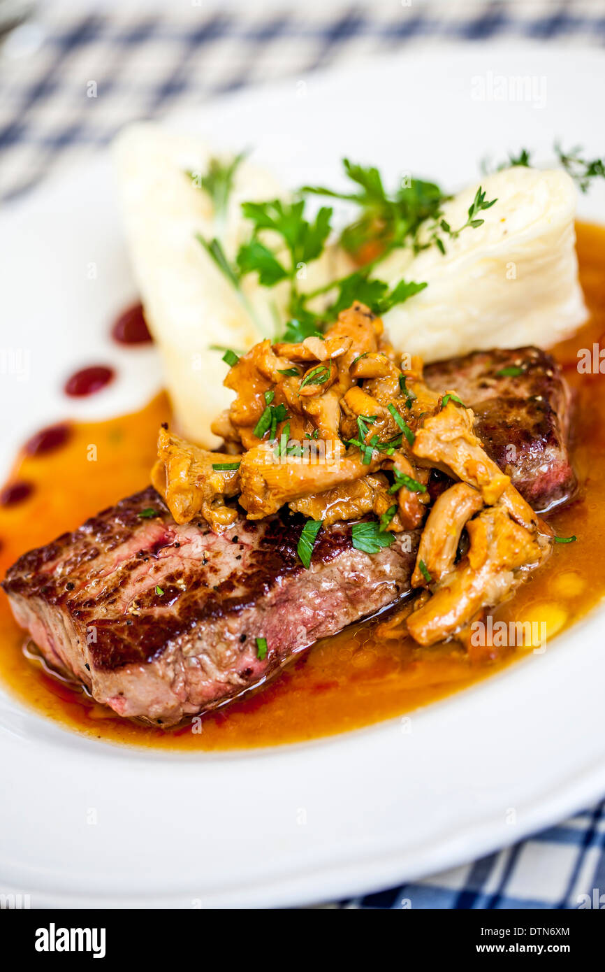 Steak with mushrooms and Polenta Ljubljana , Slovenia Stock Photo