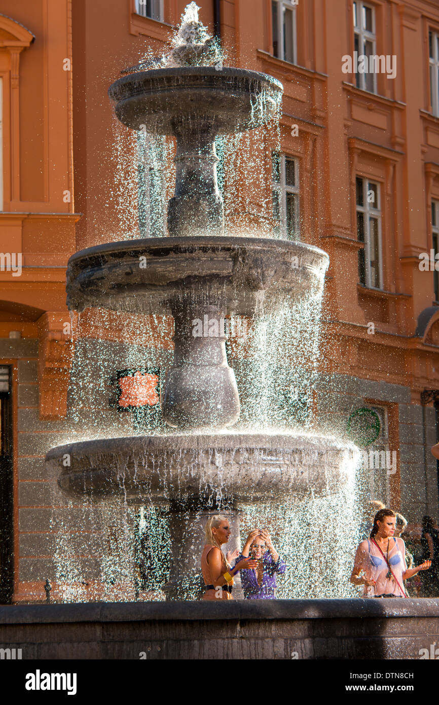 Fountain with people showering Ljubljana, Slovenia Stock Photo