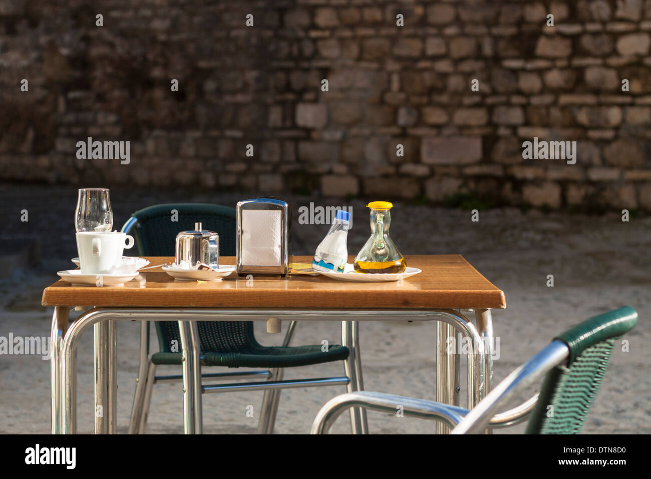 Outdoor restaurant table in Andalusia, Spain. Stock Photo