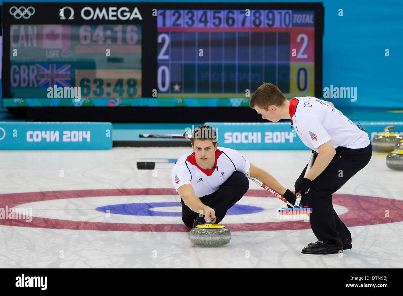 Sochi, Krasnodar Krai, Russia. 21st Feb, 2014. Great Britain's Scott ANDREWS delivers a stone during the Gold Medal Game of the Men's Curling competition from the Ice Cube Curling Centre, Coastal Cluster - XXII Olympic Winter Games Credit:  Action Plus Sports/Alamy Live News Stock Photo