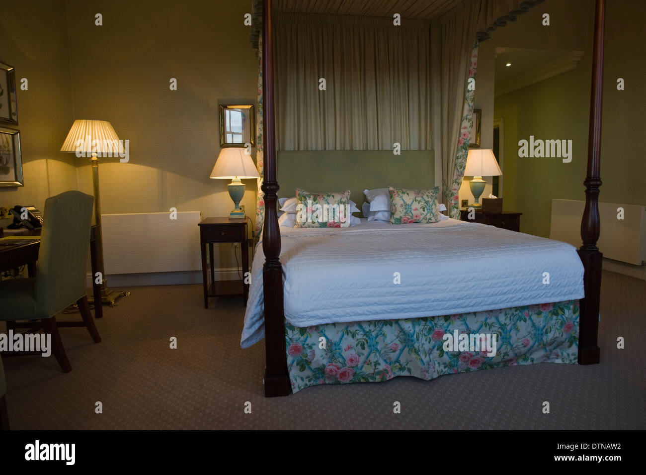 Bedroom with four poster bed at The Talbot Hotel in Malton North