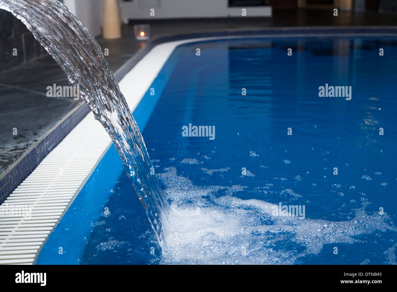 Flowing water in wellness and Spa swimming pool. Stock Photo
