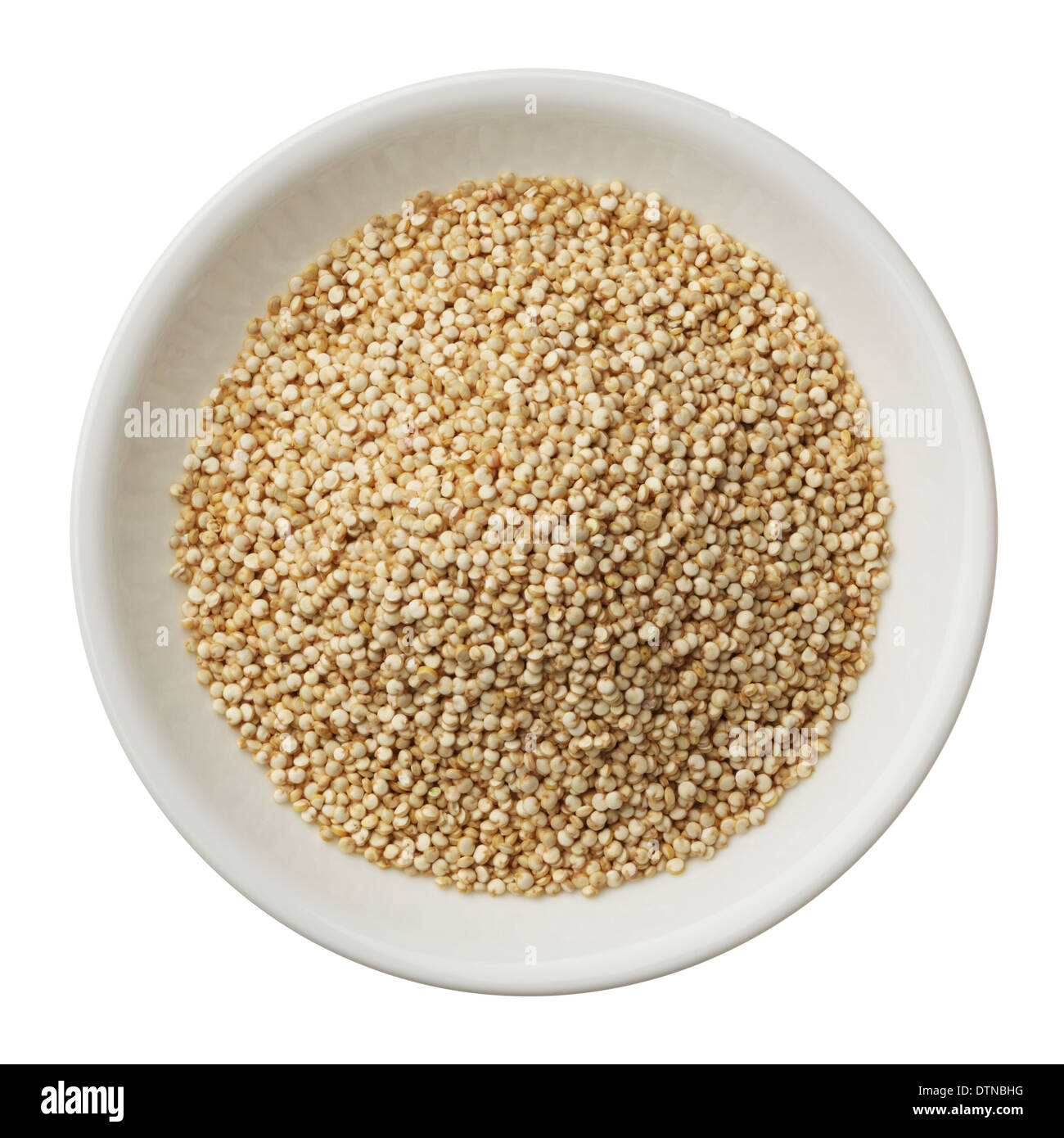 Bowl of quinoa grain isolated on a white background Stock Photo