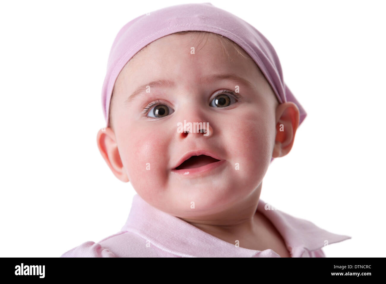 Portrait of a baby girl with large brown eyes on white background Stock
