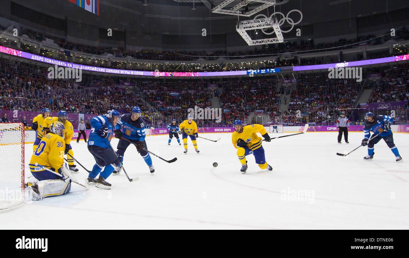 Sochi, Russia. 21st Feb, 2014. Niklas Hjalmarsson (SWE) blocks a shot on goal by Finland's Teemu Selanne. Olympic Ice Hockey Bronze Medal game (Game 27) - SWEDEN versus FINLAND at the XXII Olympic Winter Games - Bolshoi Ice Dome, Adler/Sochi, Russia. 21 Feb 2014. Credit:  Action Plus Sports/Alamy Live News Stock Photo