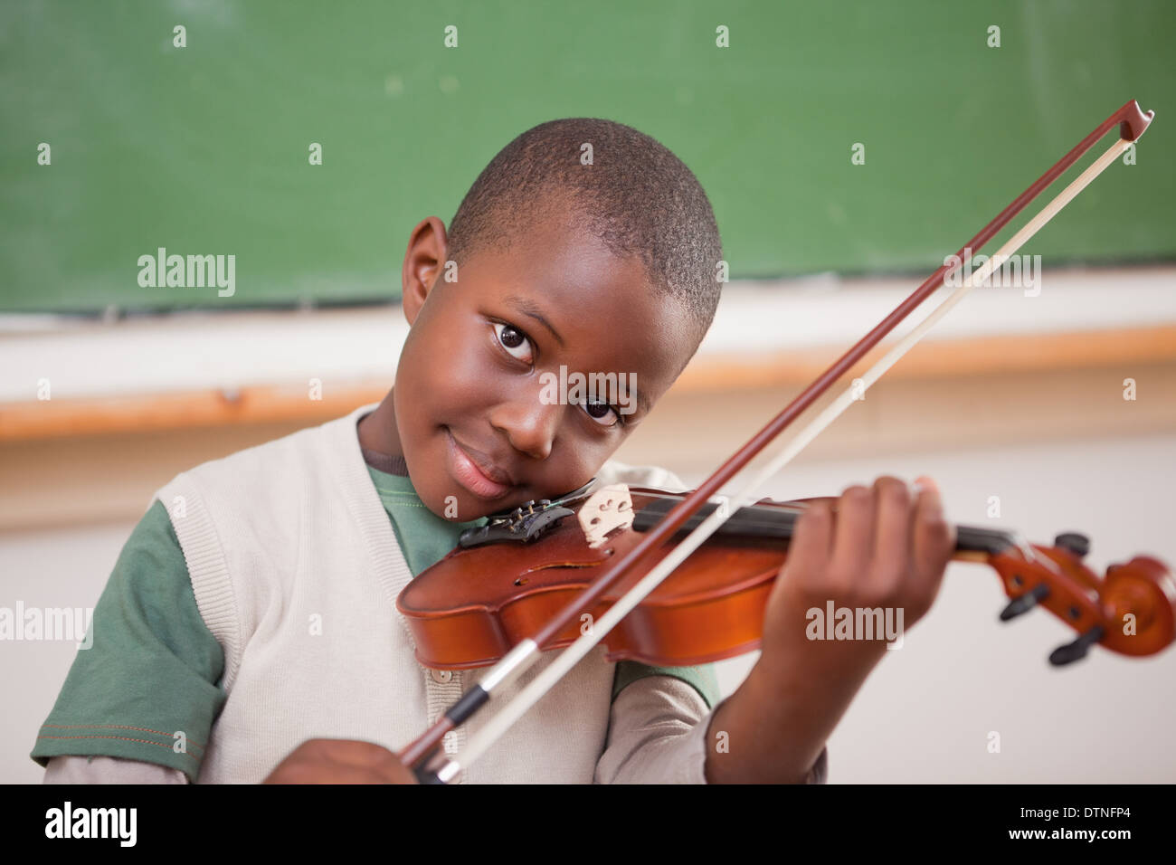 Schoolboy playing the violin Stock Photo