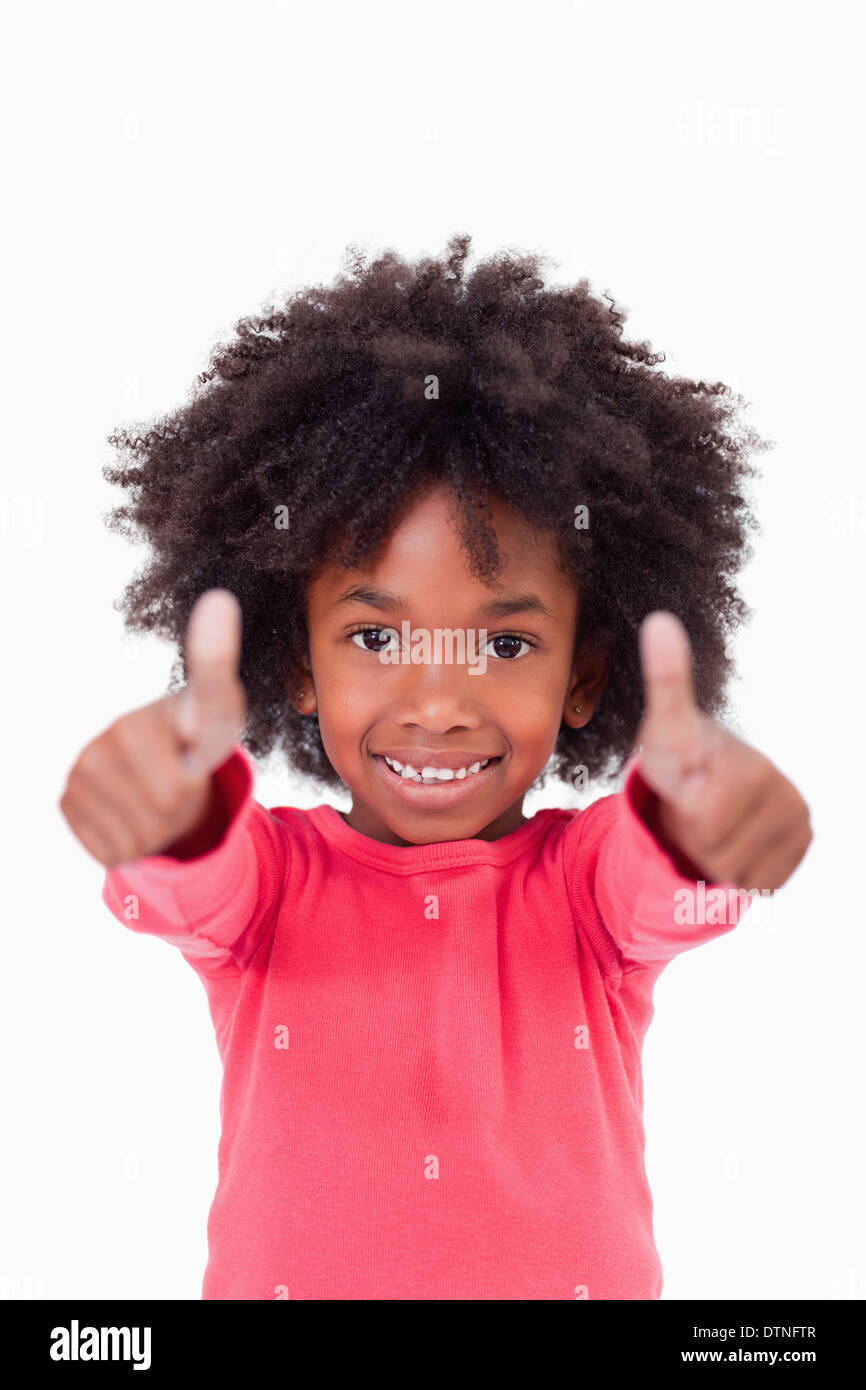 Portrait of a cute girl with the thumbs up Stock Photo - Alamy