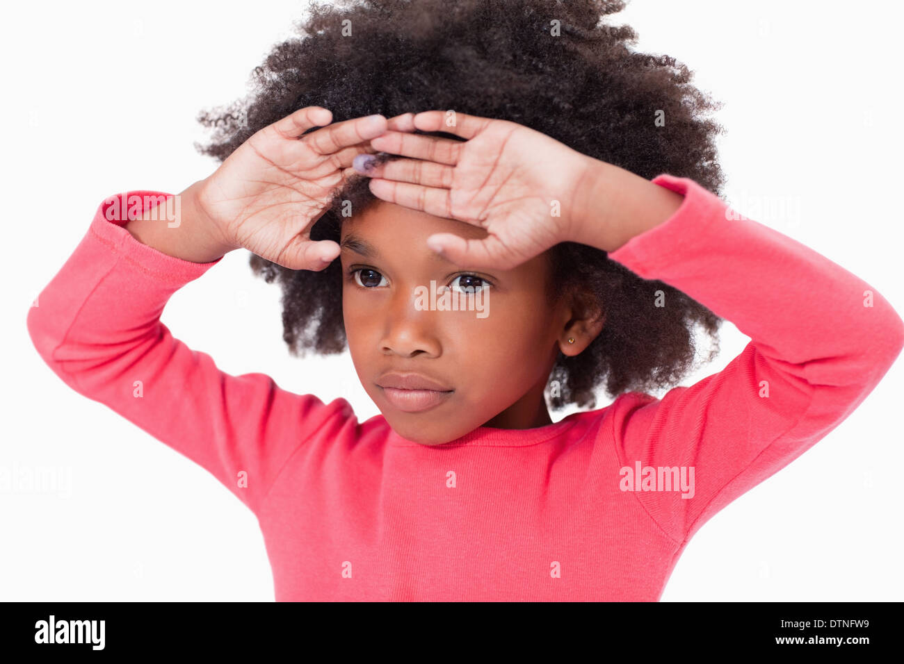 Cute girl with her hands on her forehead Stock Photo - Alamy