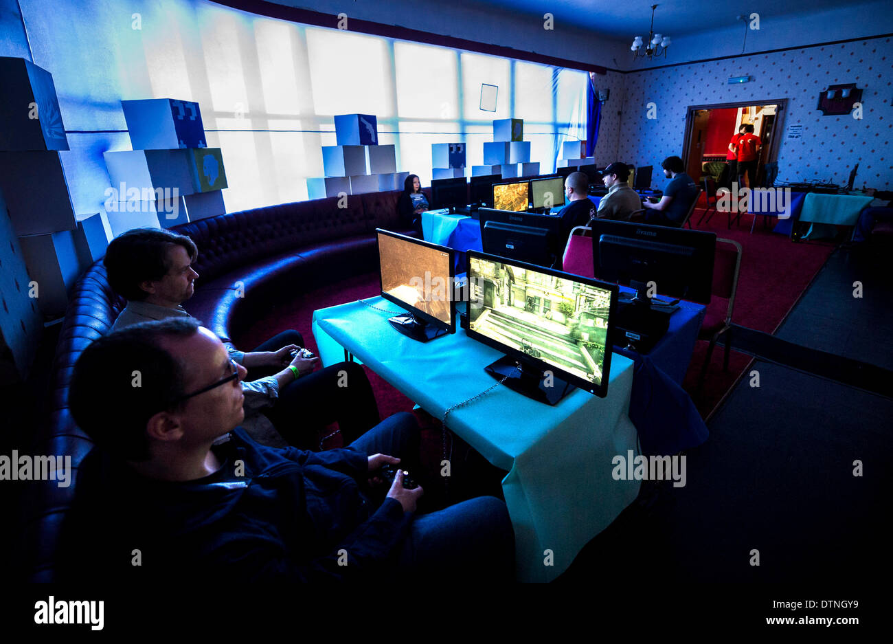 Margate, Kent, UK. 21st February, 2014.  Adult gamers enjoying themselves at GEEK 2014, a gaming EXPO in Margate.  Photographer: Gordon Scammell/Alamy Live News Stock Photo
