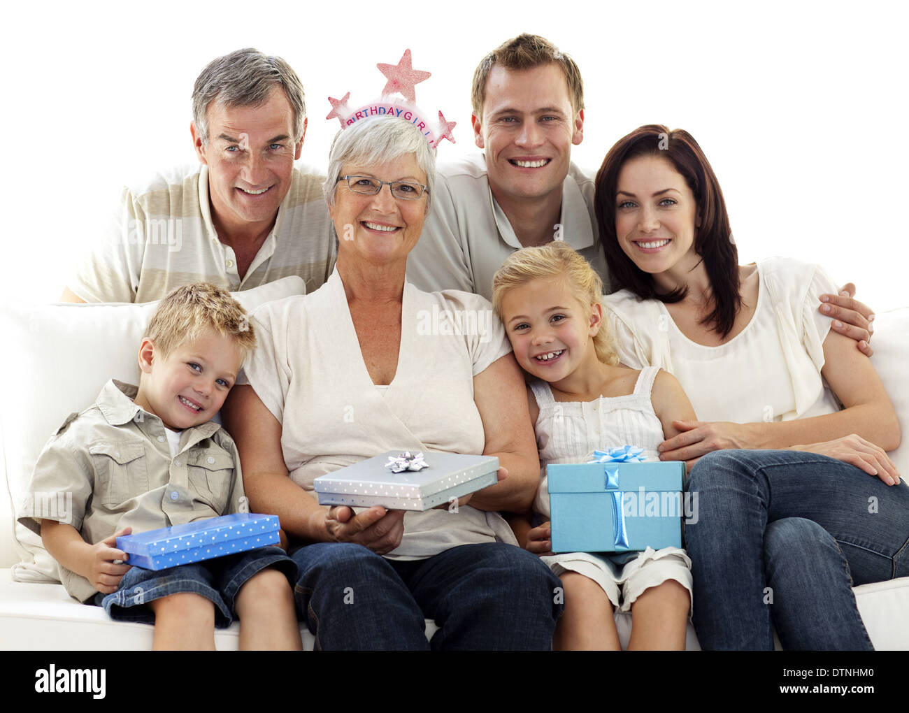 Family celebrating grandmother's birthday Stock Photo