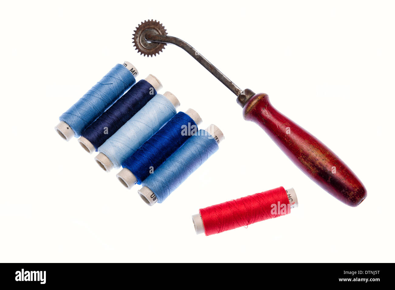 Multi colored yarns and tools to tailor Stock Photo Alamy