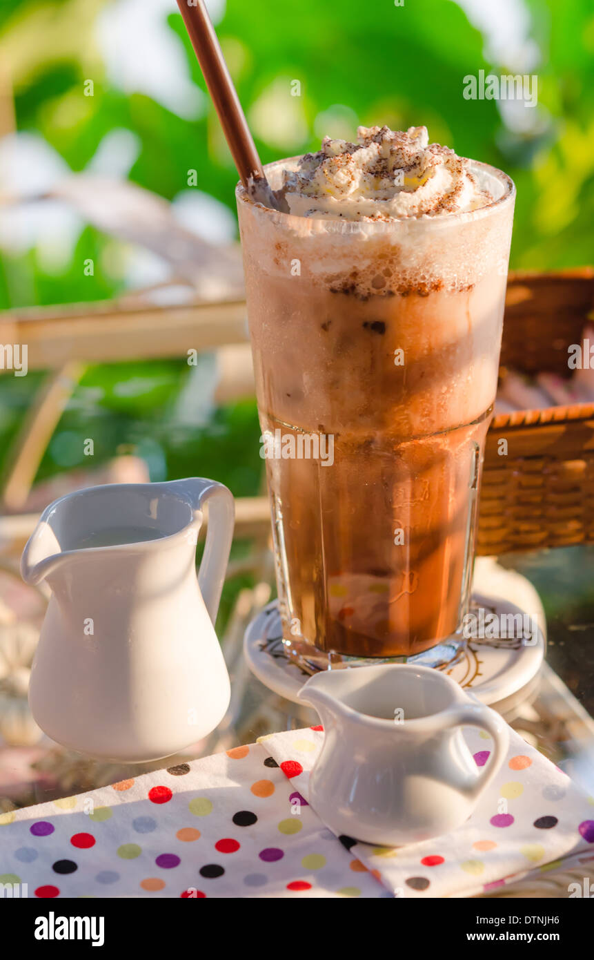 Iced coffee with whipped cream and sprinkle cocoa Stock Photo Alamy