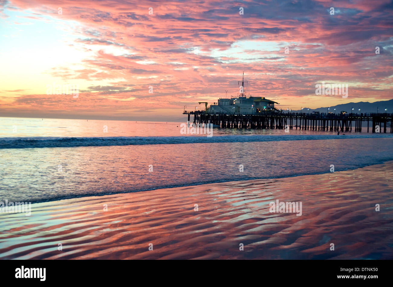 The Santa Monica pier at sunset Stock Photo