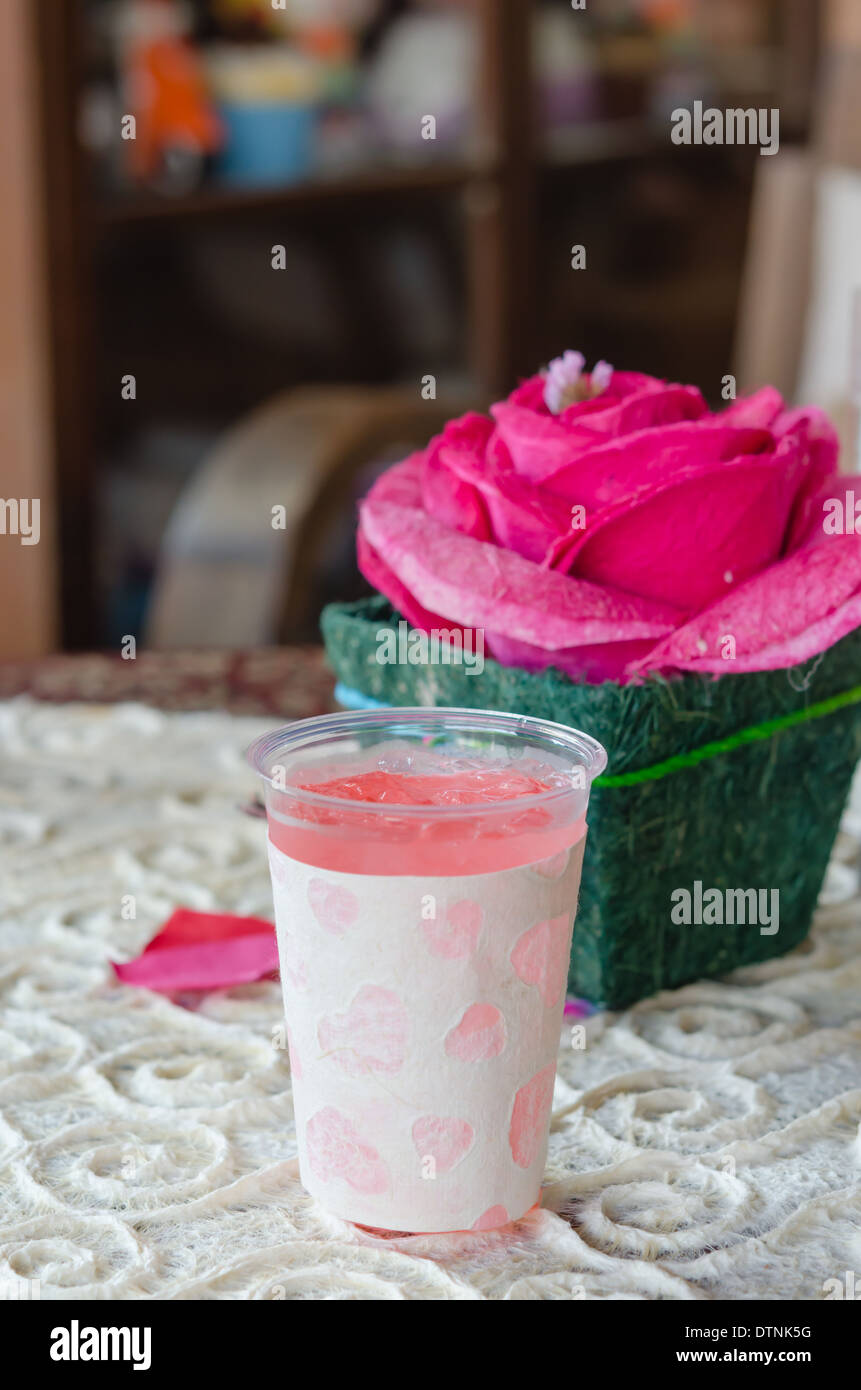 glass of beverage made from rose flower Stock Photo