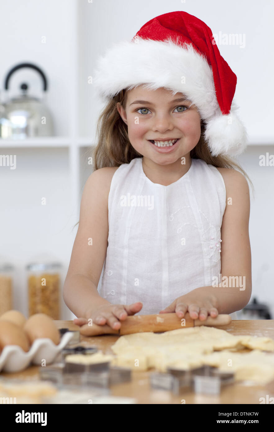 Family baking Christmas cakes in the kitchen Stock Photo Alamy