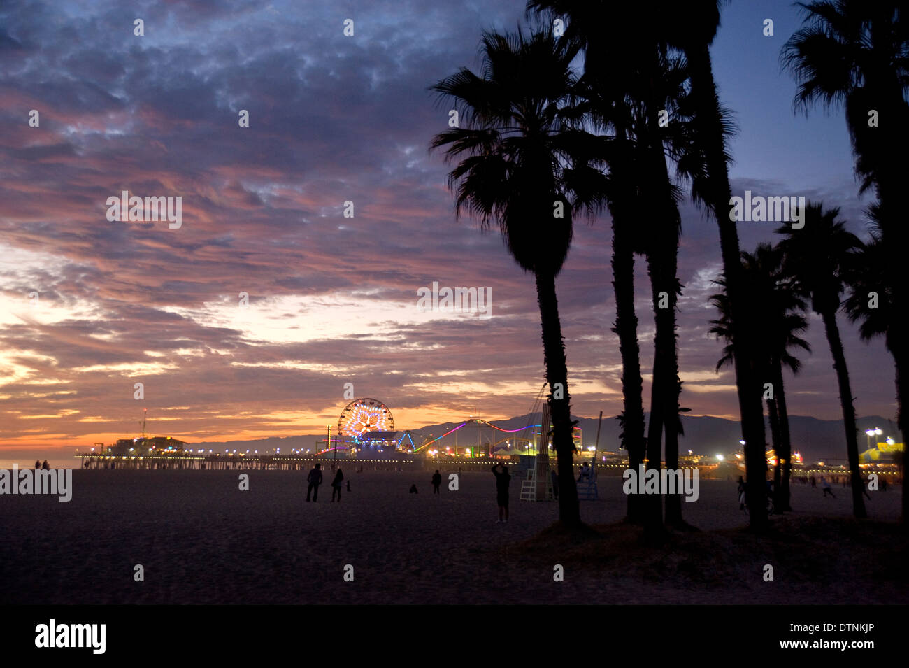 The Santa Monica pier at sunset, Los Angeles, CA, USA Stock Photo