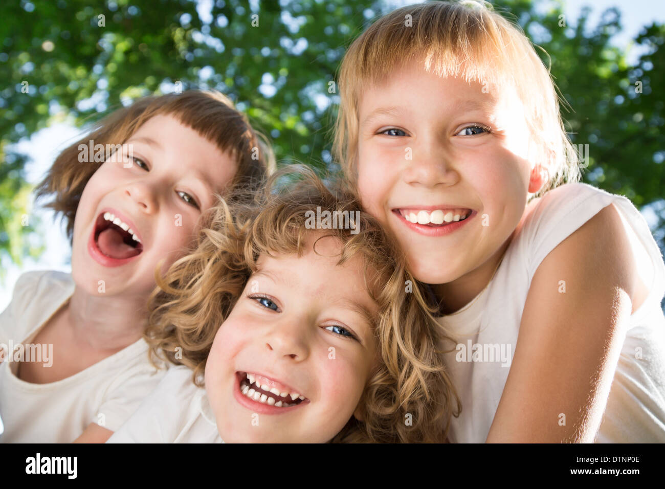 Children having fun outdoors Stock Photo