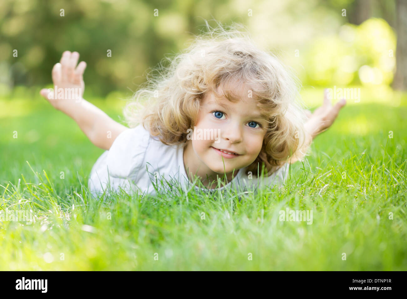 Happy child playing Stock Photo - Alamy