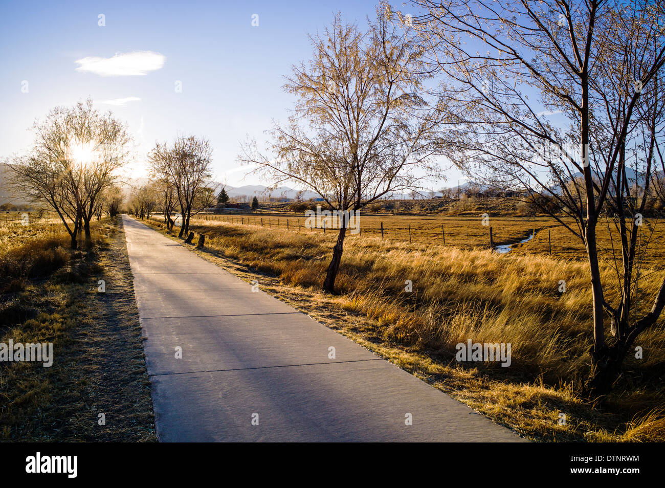 Sunset view of bike and walking path in small mountain town of Salida, Colorado, USA Stock Photo