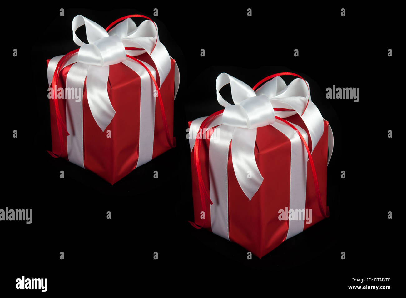 Elegant black Christmas theme. Wrapped gifts in black matte paper