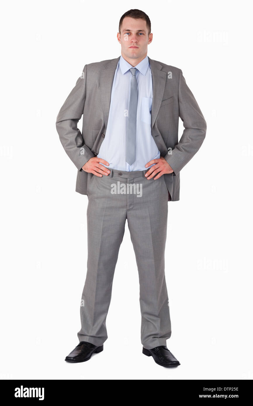 Businessman with arms akimbo Stock Photo