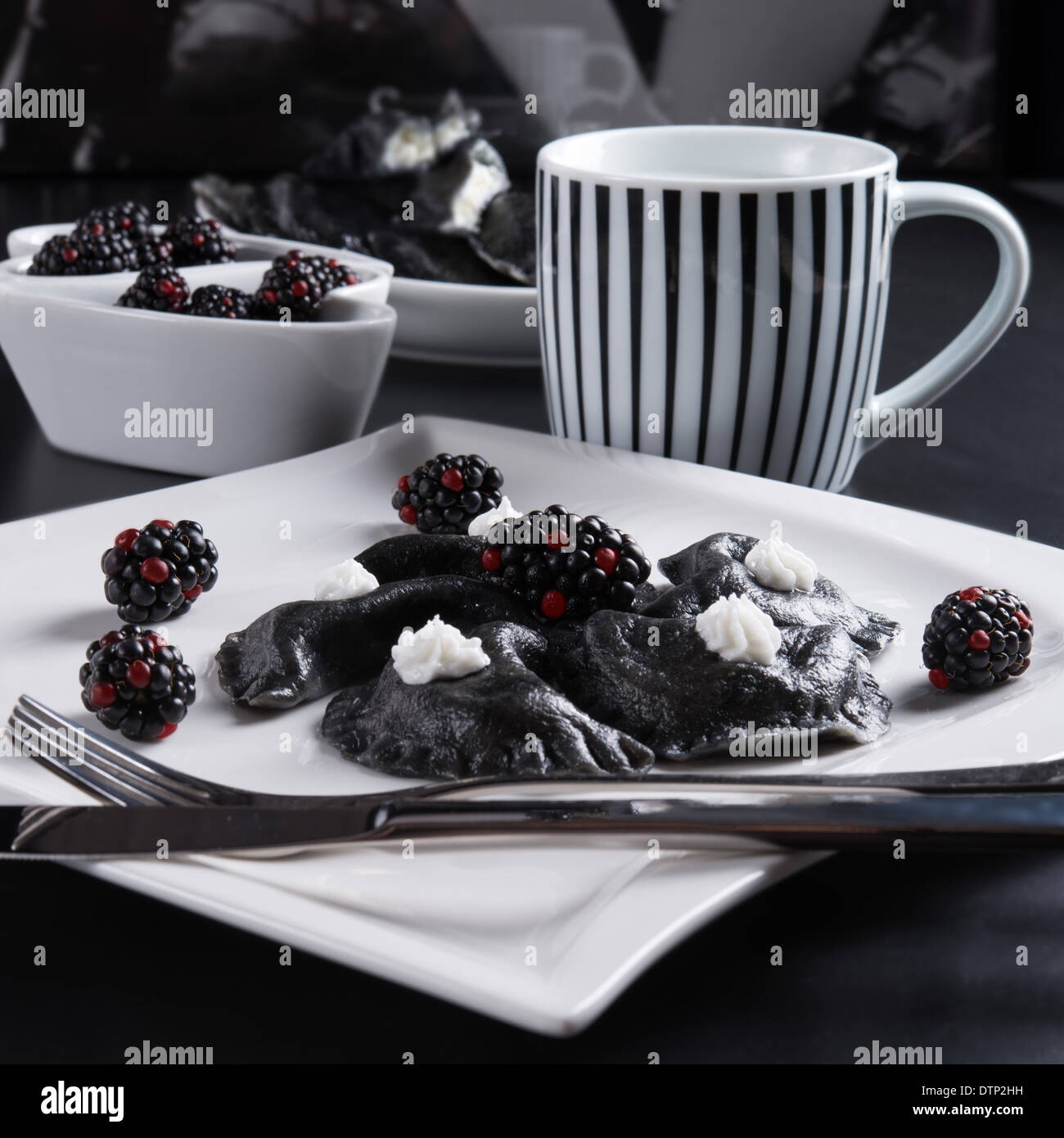 sweeten pierogi with blackberries - B & W Stock Photo