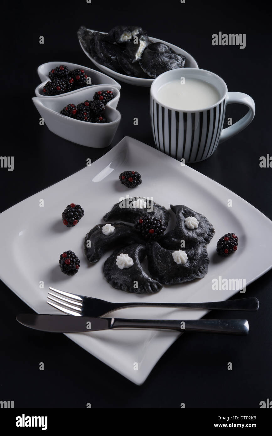 sweeten pierogi with blackberries - B & W Stock Photo