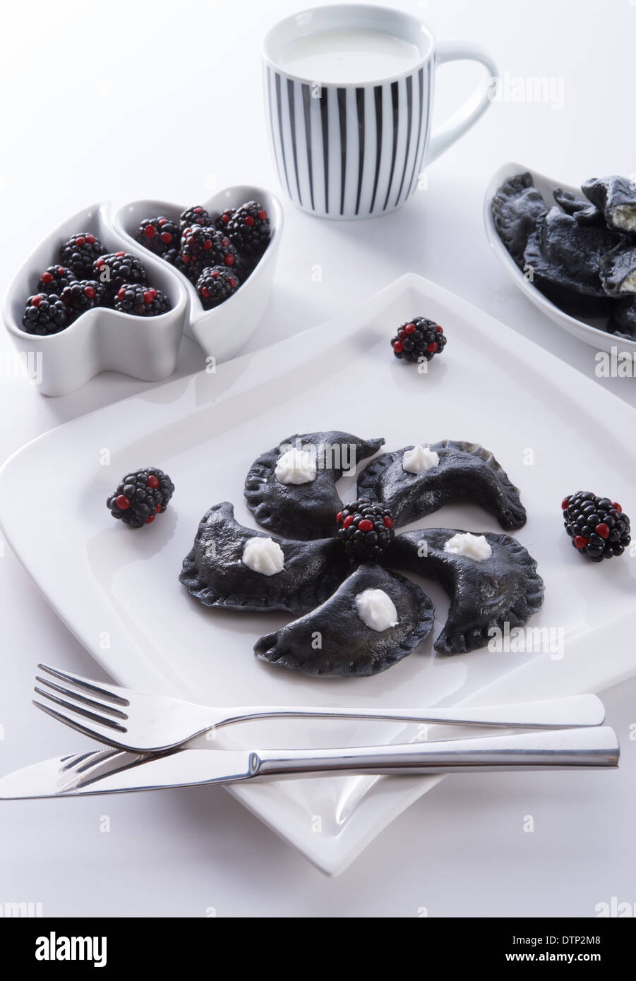 sweeten pierogi with blackberries - B & W Stock Photo