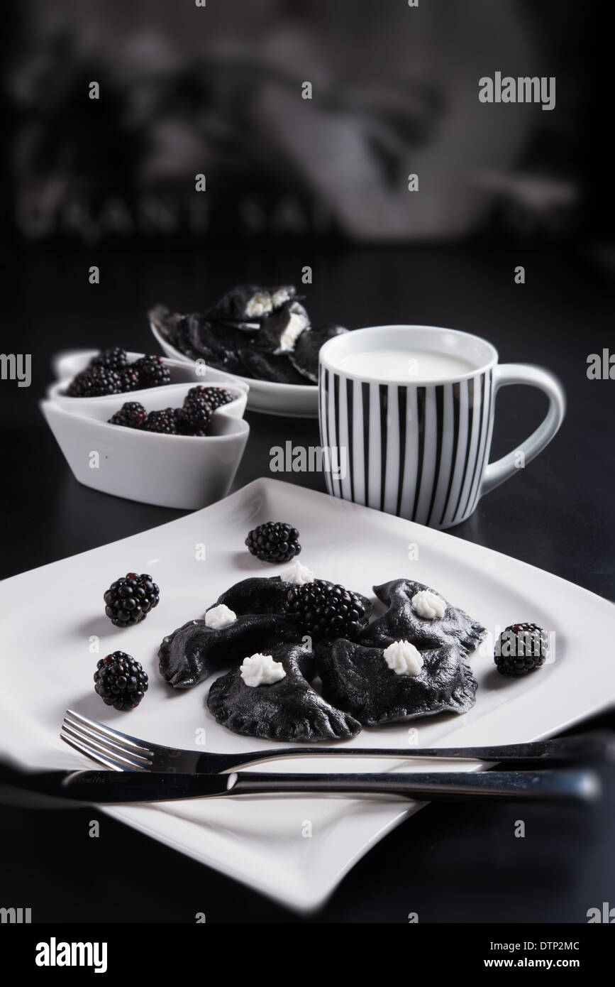 sweeten pierogi with blackberries - B & W Stock Photo