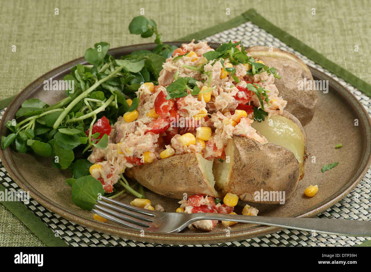 baked jacket potato with tuna salad and watercress Stock Photo Alamy