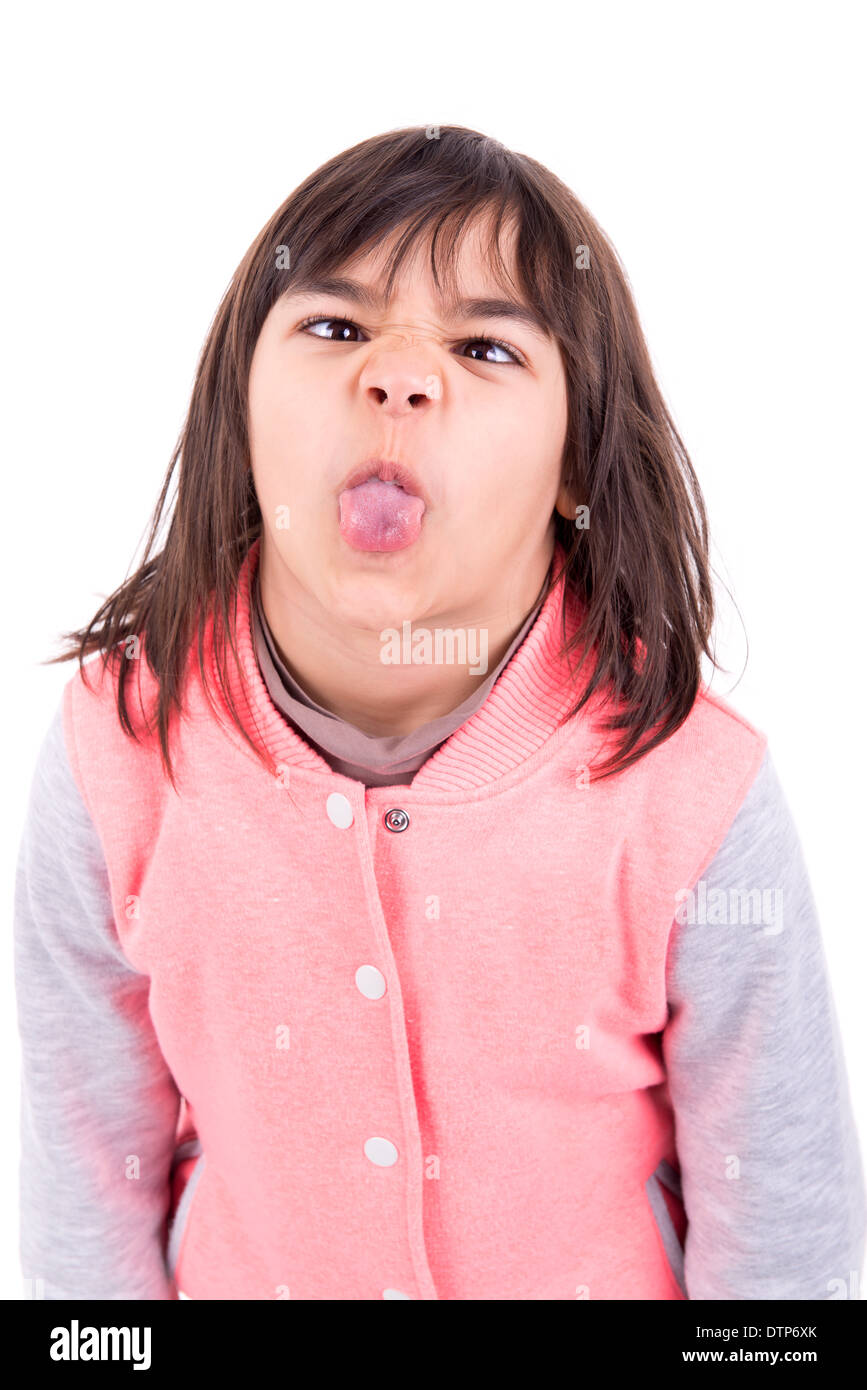 Funny young girl making faces isolated in white Stock Photo