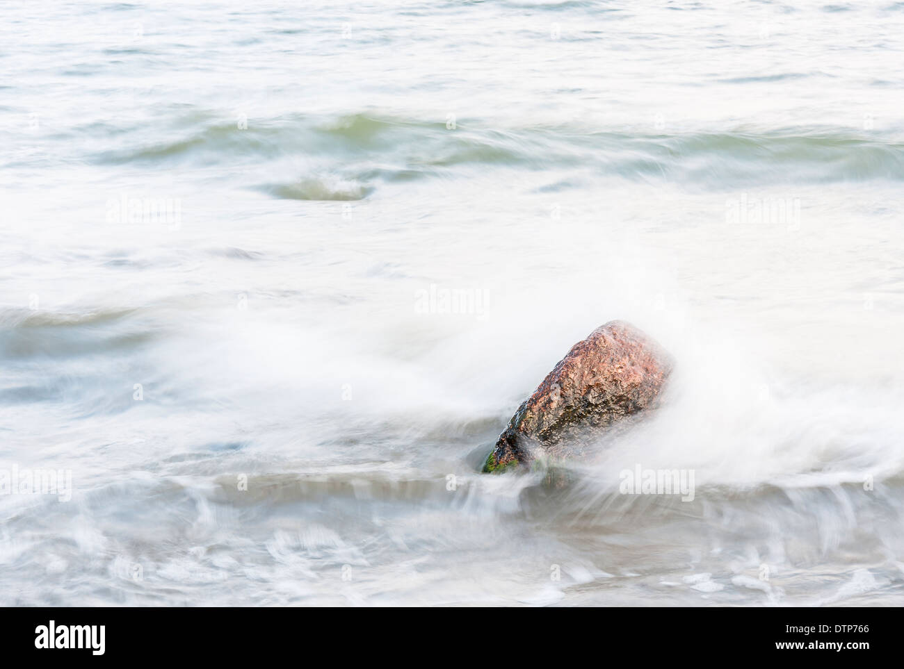 Single Sea Rocks Single stone or rock in a blurry sea Stock Photo - Alamy