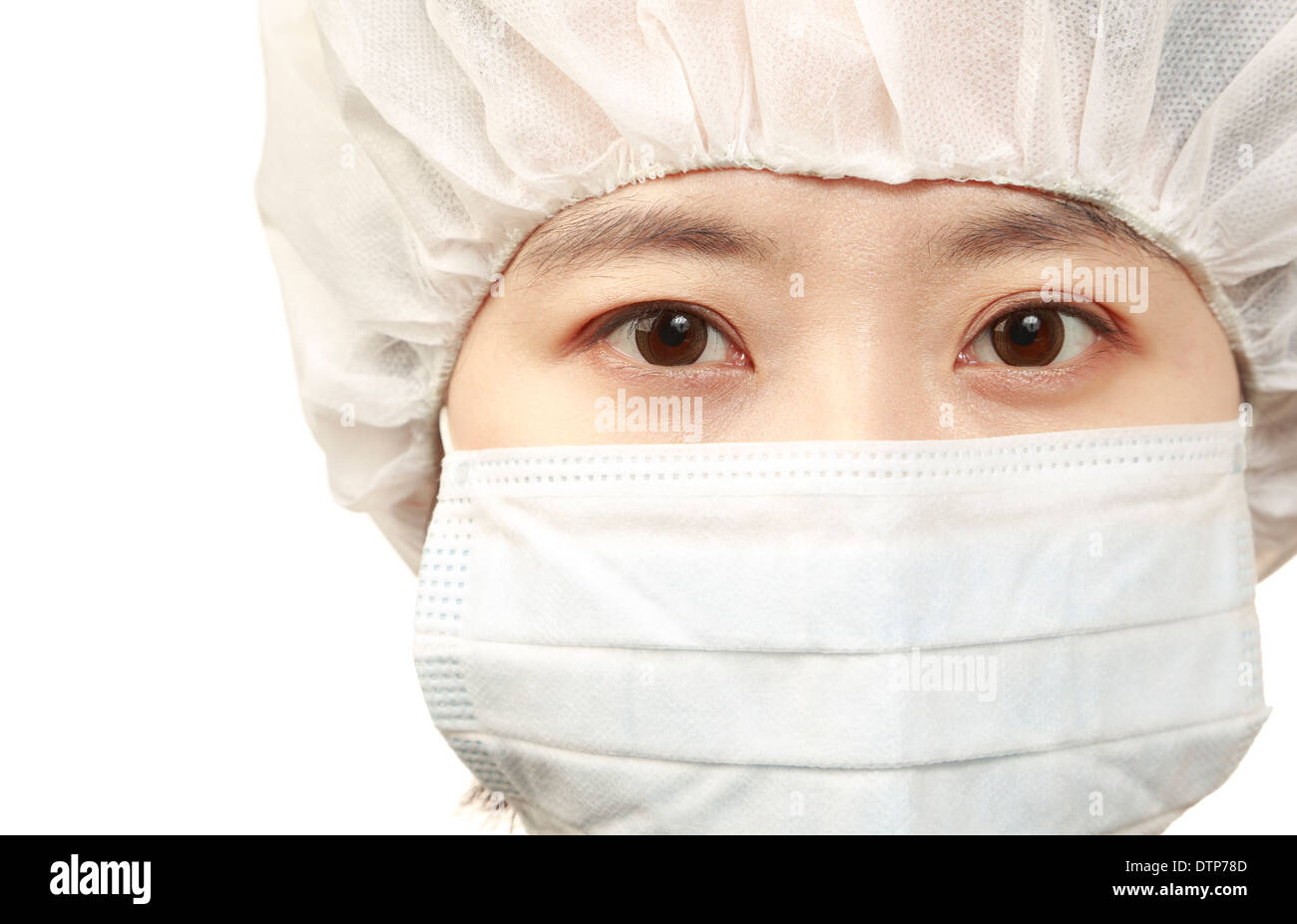 Asian woman wearing face mask on white background Stock Photo