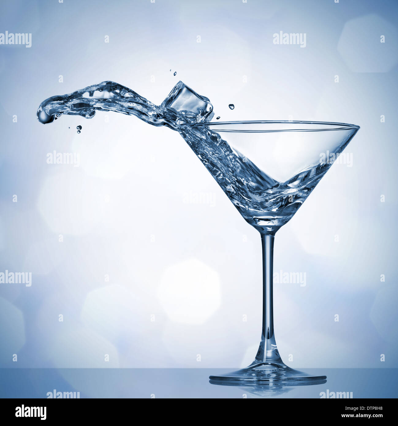 Martini splash in glass Stock Photo Alamy