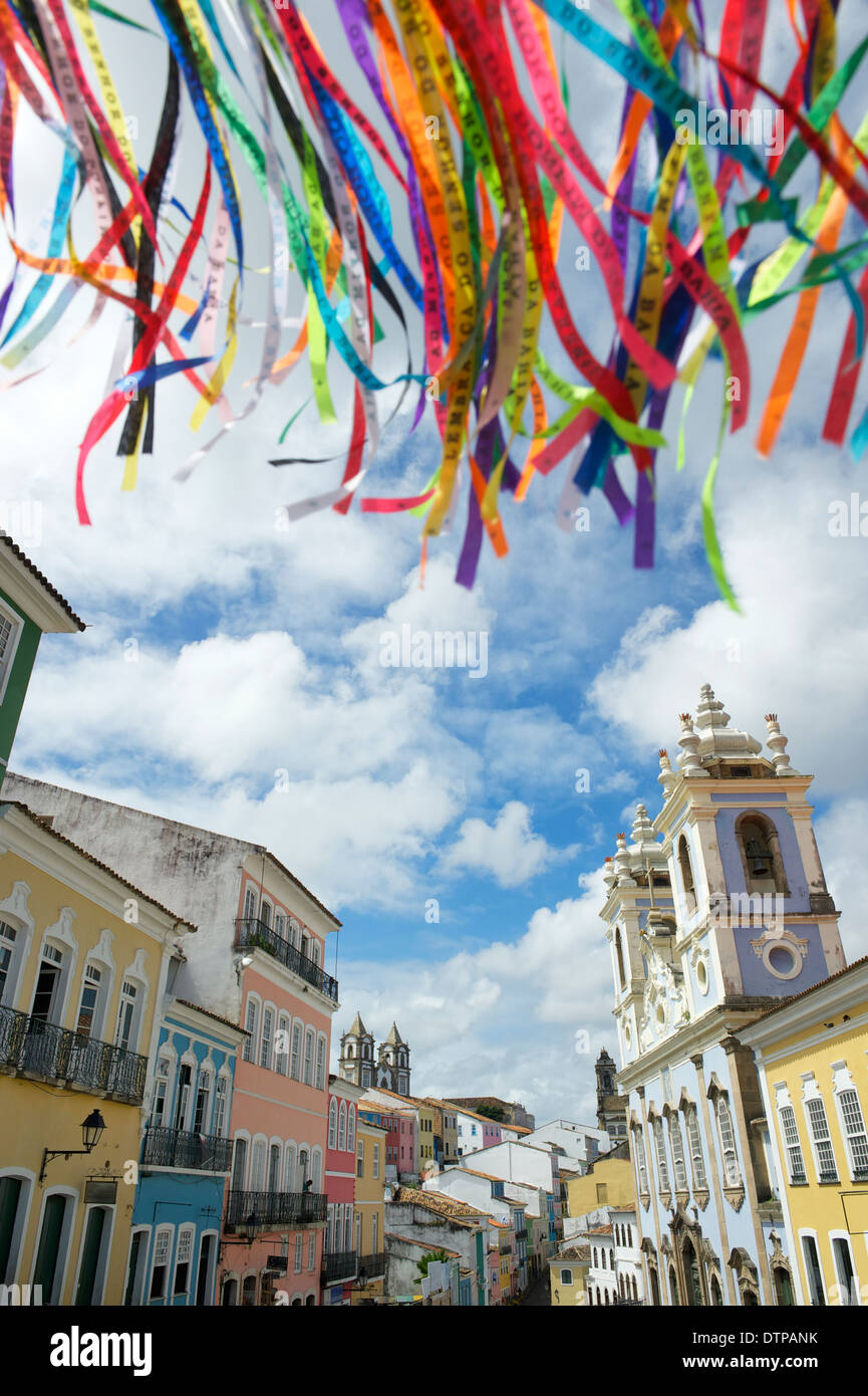 Colorful Brazilian wish ribbons waving in the sky above colonial ...