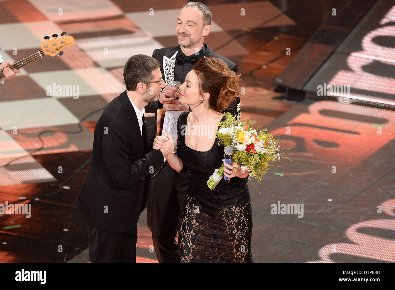 Sanremo, Italy. 21st Feb, 2014. Violante Placido (R), Perturbazione and Fabio Fazioattend the fourth night of the 64rd Sanremo Song Festival at the Ariston Theatre on February 21, 2014 in Sanremo, Italy. Credit:  Manuel Romano/NurPhoto/ZUMAPRESS.com/Alamy Live News Stock Photo