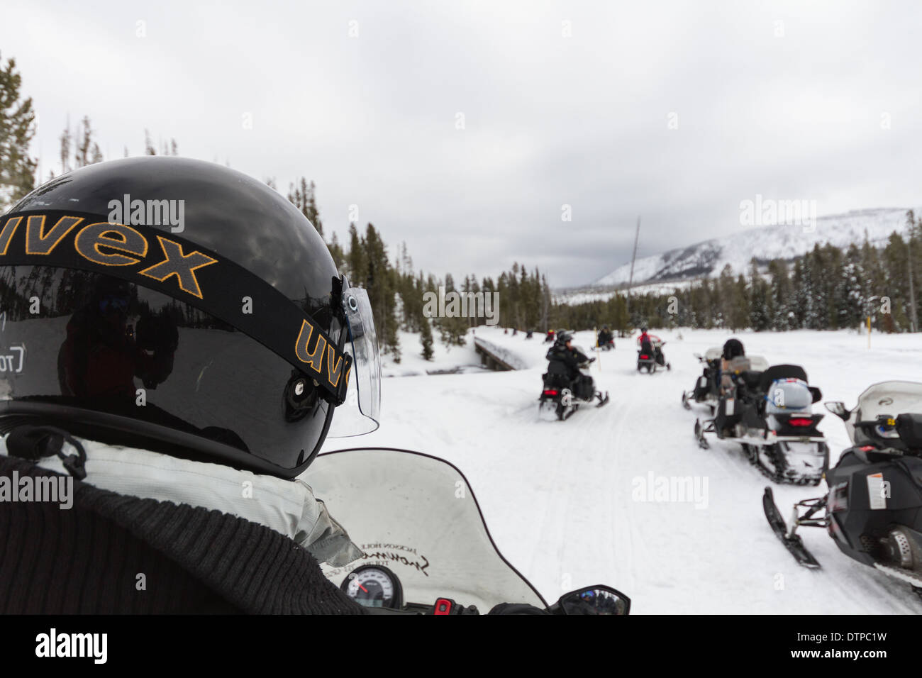 Snowmobile Tour through the Yellowstone National Stock Photo Alamy